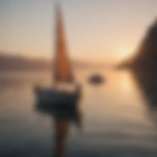 Sunrise over calm waters with a sailboat in the distance