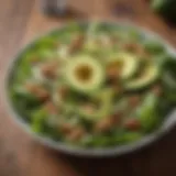 Fresh green salad with avocado slices and nuts