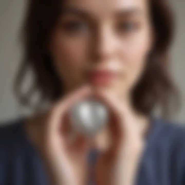 Woman holding a heart-shaped locket with a message inside