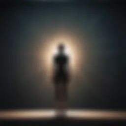 Silhouette of a person standing under a glowing light