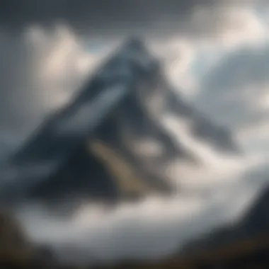 Majestic mountain peak shrouded in mist and clouds