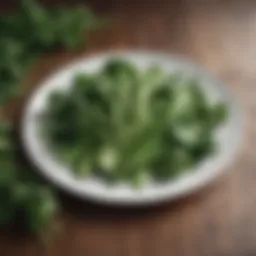 Fresh green vegetables on a white plate