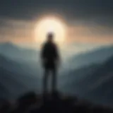 Silhouette of a person standing confidently on top of a mountain